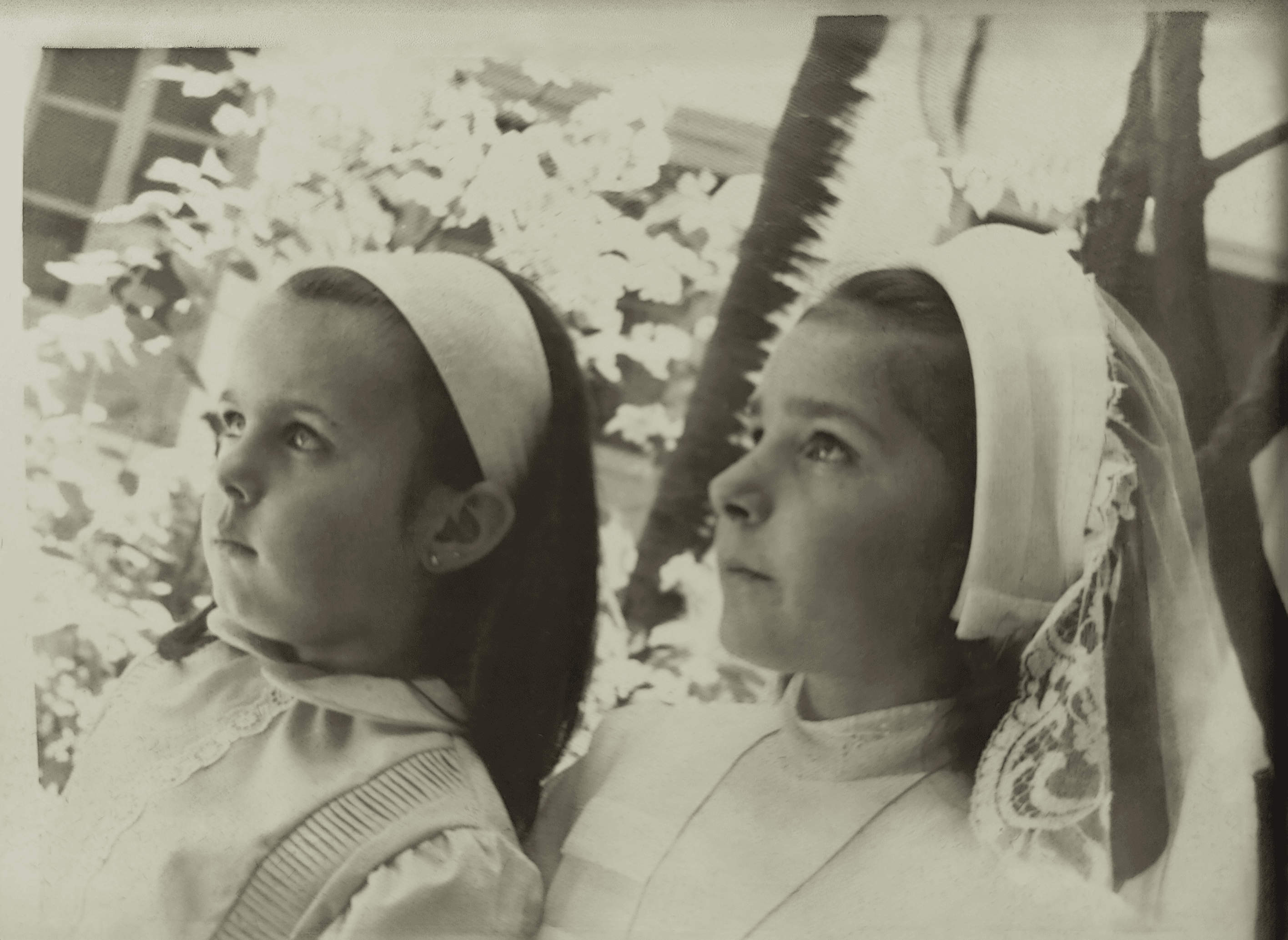 Blurry old photo with visible scratches and creases before restoration